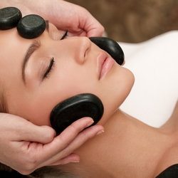 Massage CORPS et VISAGE aux PIERRES CHAUDES